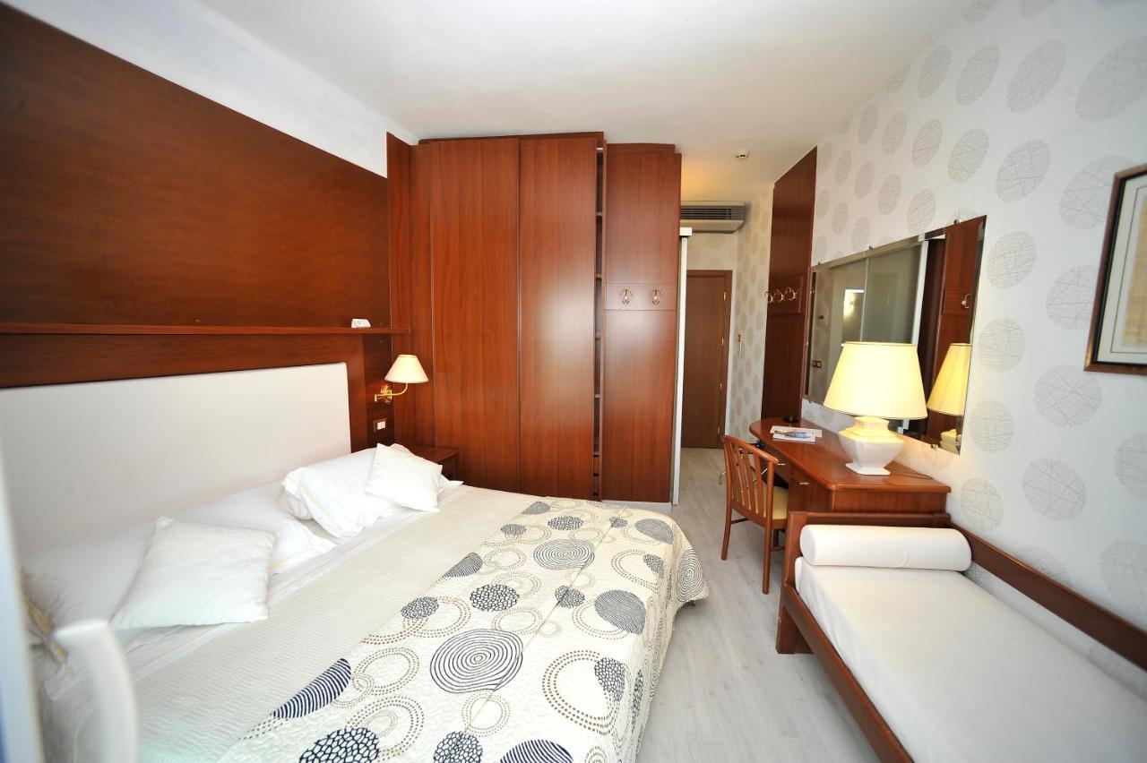 Double or Twin Room with Balcony and Lateral Sea View,765643810:JPEG